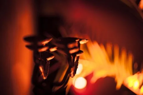 Close-up of Metallic Objects with Warm Background Lights Stock Photos