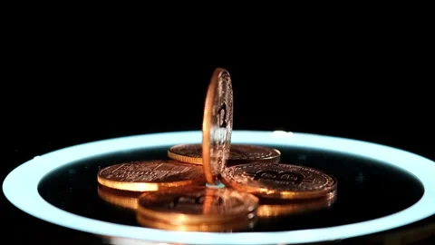Close-up of metallic shiny bitcoin cryptocurrency coins. Stockbeeldmateriaal 264119236