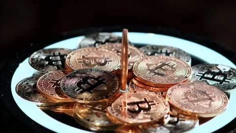 Close-up of metallic shiny bitcoin cryptocurrency coins. Stockbeeldmateriaal 264120593