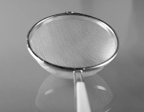 Close up of metallic strainer with plastic handle Stock-Fotos