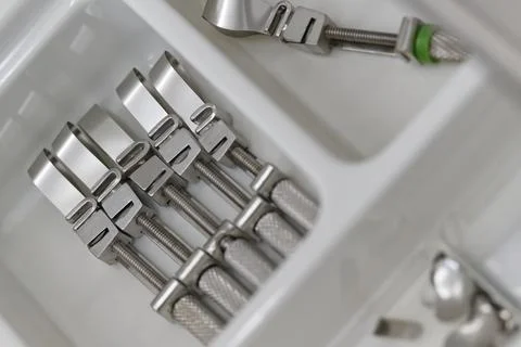Close-Up of Metallic Tools in a White Tray Stock Photos