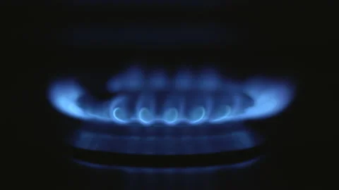 Close-up of a methane gas stove that slowly goes out in the dark Stock-Footage 170388564