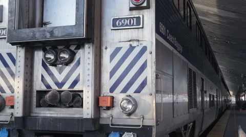 Close up of Metrolink Amtrak train leaving LA Union Station platform Stock Footage 61105419