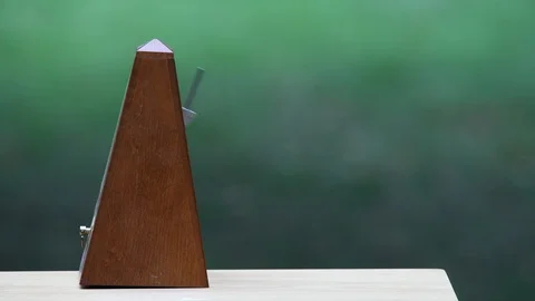 Close up of a metronome with copy space and a shallow depth of field Stock Footage 94703261