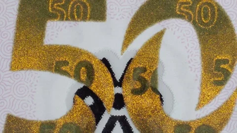 Close Up of Mexican 50 Peso Banknote Showing Gold Number Design and Security Stock Footage 346796947