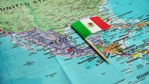 Close-up of Mexican flag against background of political map of North America Stock Footage 327598174