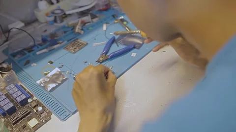 Close-up of Microchip Quality Control Analysis in Tech Laboratory Stock Footage 336610085