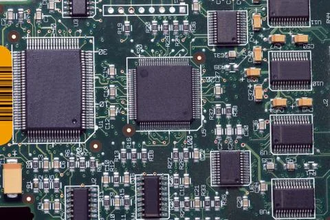 Close-up on a microchip on a scheme background Stock Photos