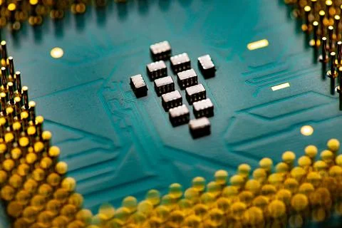 Close up of microchips and pins on Main CPU PC processor circuit board. 스톡 사진