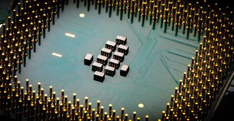 Close up of microchips and pins on Main CPU PC processor circuit board. 写真素材