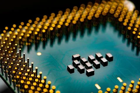 Close up of microchips and pins on Main CPU PC processor circuit board. Foto stock