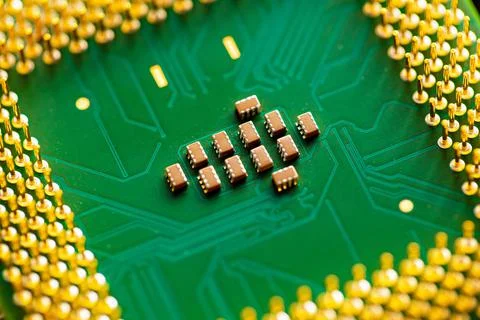 Close up of microchips and pins on Main CPU PC processor circuit board. 写真素材