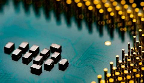Close up of microchips and pins on Main CPU PC processor circuit 写真素材