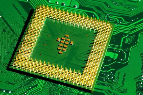 Close up of microchips and pins on Main CPU PC processor circuit board. Ma... Foto stock