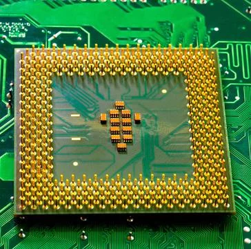 Close up of microchips and pins on Main CPU PC processor circuit board. Ma... 写真素材