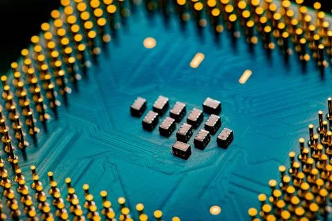Close up of microchips and pins on Main CPU PC processor circuit board. Ma... Stockfoto's