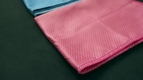 Close-up microfiber cleaning cloth,microfiber cleaning cloth in blue and pink Stock Footage 172078583