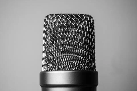 Close-Up Of Microphone Against Gray Background Stock Photos
