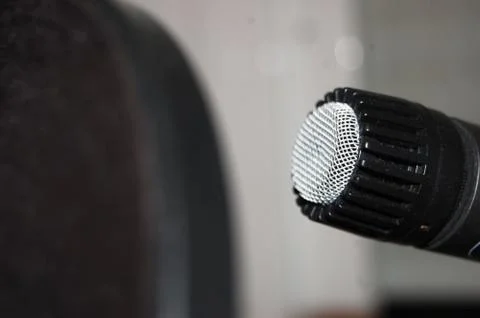 Close up of microphone and pop shield at recording studio Stock Photos