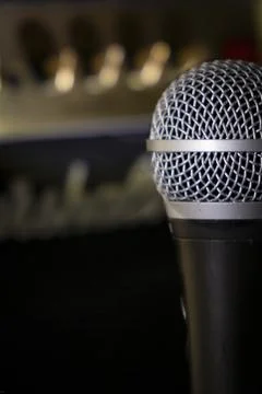 Close up of a microphone on a black background with copy space Stock Photos