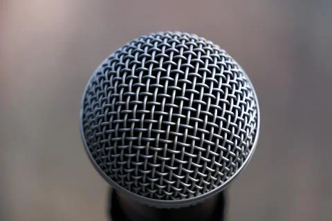 Close up of a microphone on a blurred background Stock Photos