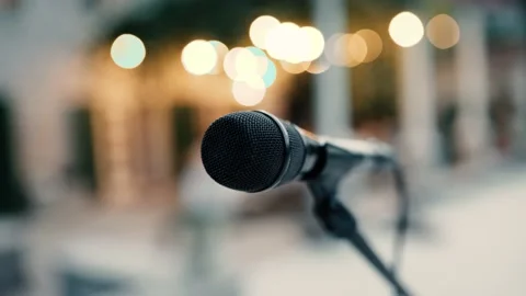Close-up microphone with bokeh lamps Stock Footage 166120598