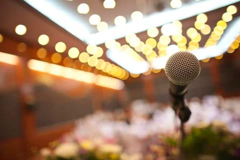 Close up of microphone in concert hall or conference room Stock Photos