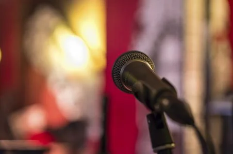 Close-up of a microphone in front of a blurred background Stock Photos