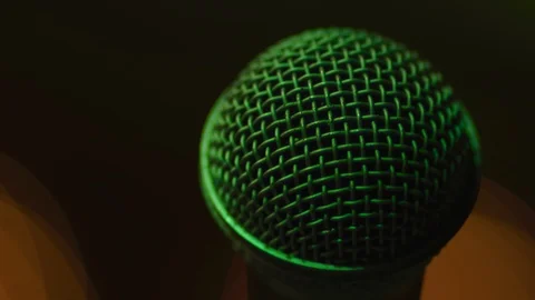 Close-up of microphone with green light effect Stock Footage 114644497