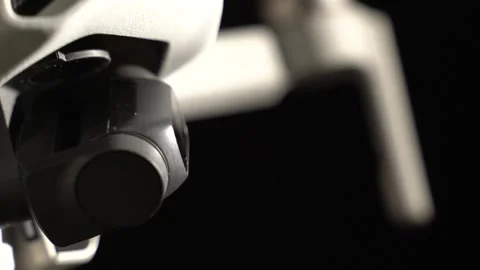 Close-up of microphone on stage against a black background with white lighting Stock Footage 152182712