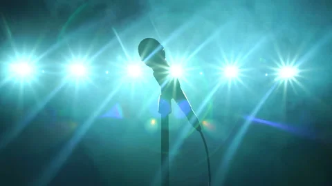 Close-up of microphone on stage in the dark on a black smoky background. Stock Footage 95479574