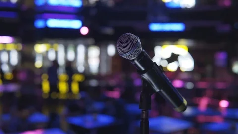 Close-up of the microphone on the stage stand in the night bar. Stock Footage