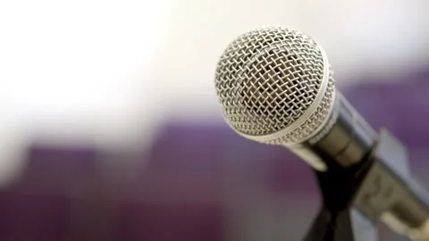 Close-Up of Microphone on Stand in Bright Room Stock Footage 307636323