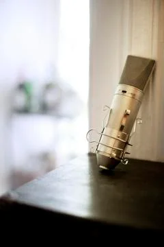 Close-up of microphone on wooden table Stock Photos