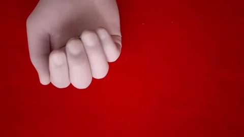 Close-up of microplastic particles in person's hand wearing medical gloves. Vídeo Stock 241065815