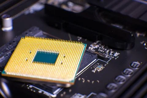 Close-up of a microprocessor chip on a computer motherboard Stock Photos