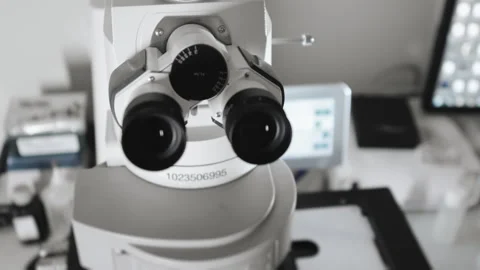 Close-up of a microscope eyepiece in a scientific research laboratory. Stock Footage 294194009