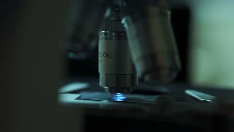 Close-up Microscope Lens With Blood Sample In Laboratory, Science 스톡 동영상 131119930