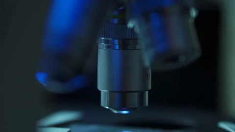 Close-up Microscope Lens With Blood Sample In Laboratory, Science Stock Footage 131119962