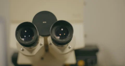 Close-Up of Microscope Lenses in Laboratory Stock Footage 318593260