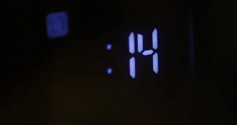 Close up of microwave digital clock timer counting down Stock Footage 120689095