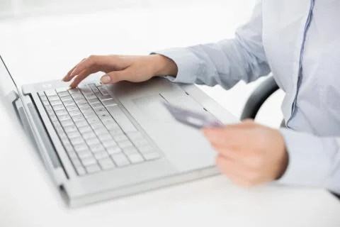Close up mid section of a woman doing online shopping Stock Photos
