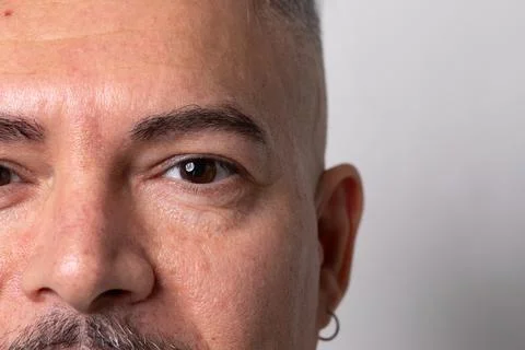 Close up of middle-aged hispanic man with serious expression 스톡 사진