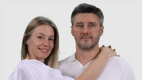 Close-up of middle aged loving couple looking at camera, alpha channel in Stock Footage 304810009