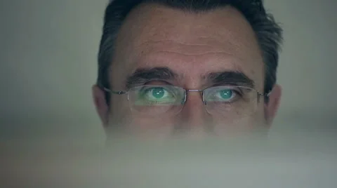 Close up middle-aged man working on a computer Stock Footage 39490743