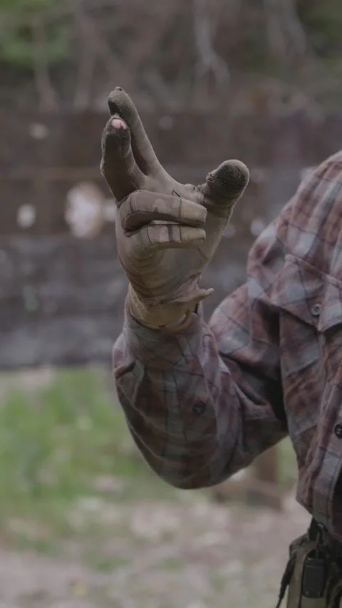 Close up of military instructor hand gesturing while explaining mission Stock Footage 333612661
