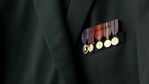 Close up military metals on suit jacket Stock Footage 170383339