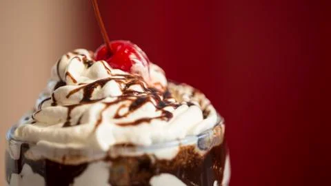 Close Up On Milkshake with Cherry on Top Stock Photos