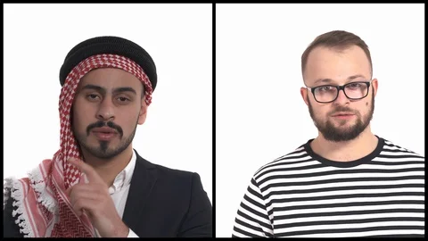 Close-up of millennial multiethnic men demonstrating silence sign. Keeping Stock Footage 129751912