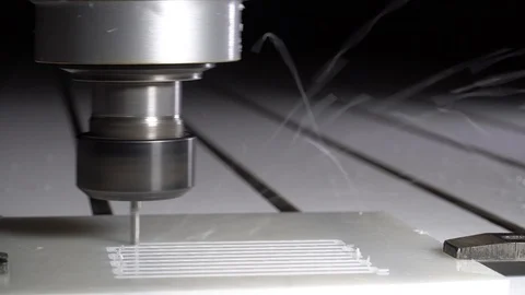 Close up.  Milling machine makes plastic parts. The milling cutter processes. 4K Stock Footage 102302093